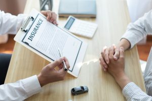 insurance company telling employee about pre-existing condition